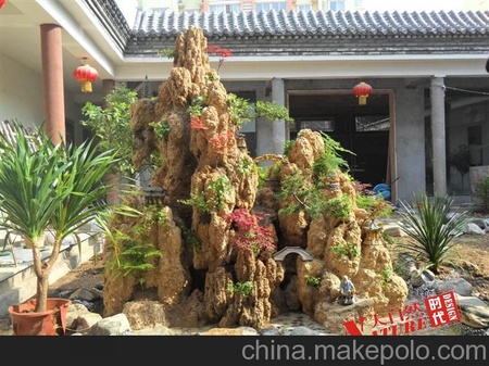 青岛专业设计施工自然亲和上水石假山批发销售各种假山石